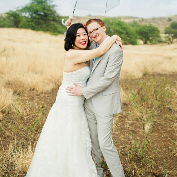 Strapless lace-overlayed wedding dress